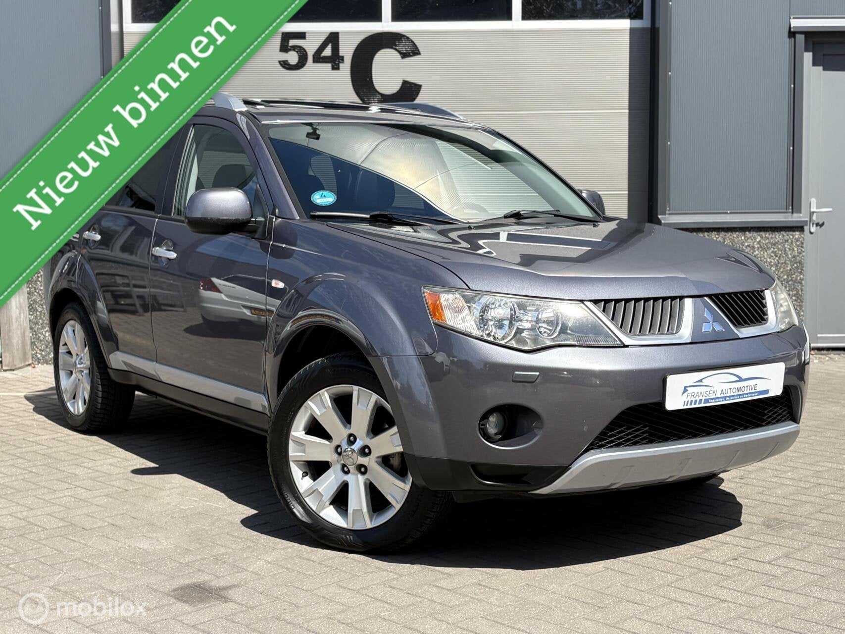 Mitsubishi Outlander 2.4 Cruise/Airco/eerste eigenaar !, Auto's, Mitsubishi, Automaat, Zwart, 4 cilinders, 7 stoelen