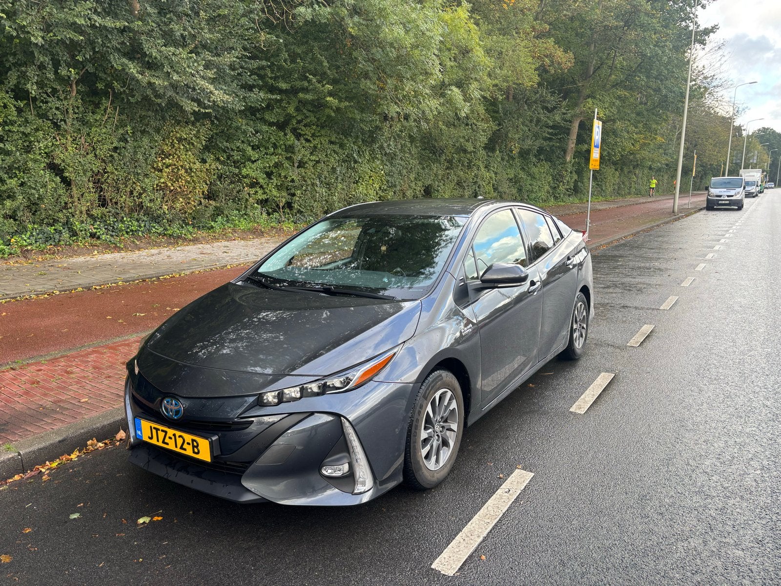 Toyota Prius 1.8 Plug-in Hybrid 122PK Aut 2021 Grijs, Auto's, 77 km/l, 1505 kg, Prius, Te koop