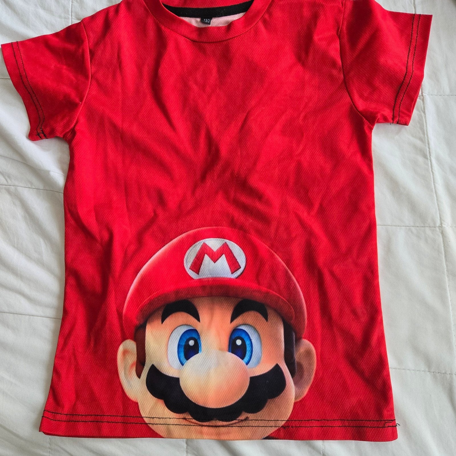 Super Mario T-shirt maat 130, Super Mario, Gebruikt, Jongen of Meisje, Ophalen of Verzenden