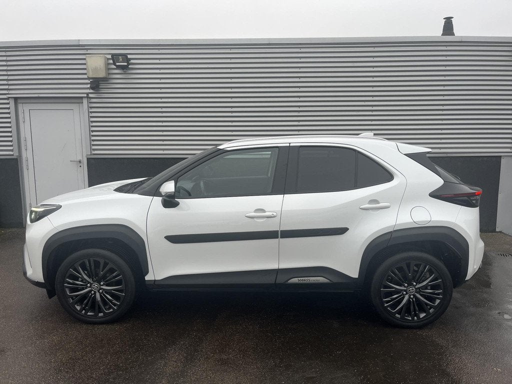 Toyota Yaris Cross 1.5 Hybrid Adventure AWD Panoramadak, Sto, Auto's, Toyota, Gebruikt, Wit, 1490 cc, Bedrijf