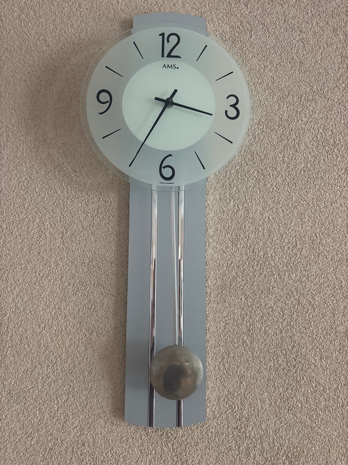 wandklok met slinger (AMS), Ophalen