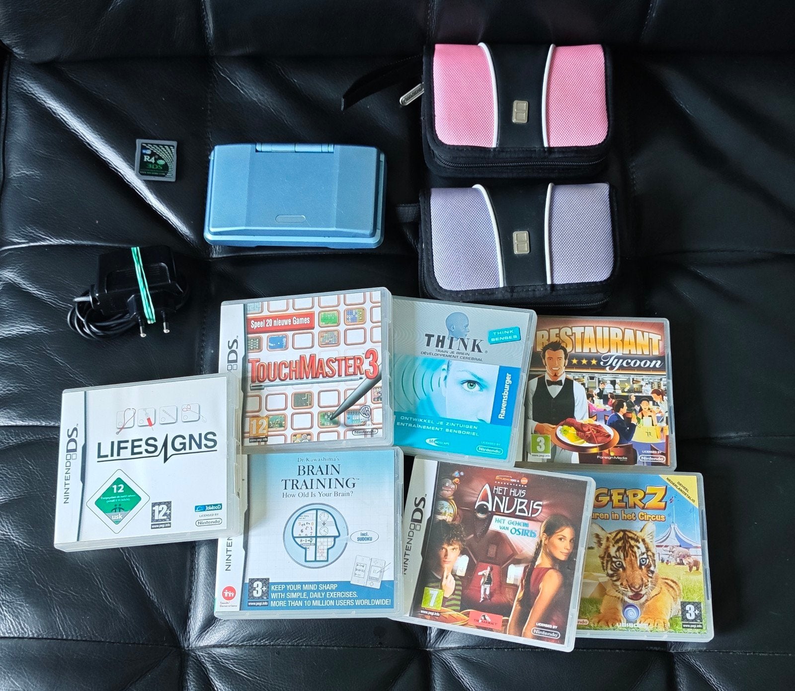 Nintendo DS Phat Blauw,7 games + meer dan 100 op R4, Gebruikt, Blauw, DS Original of Phat, Ophalen of Verzenden