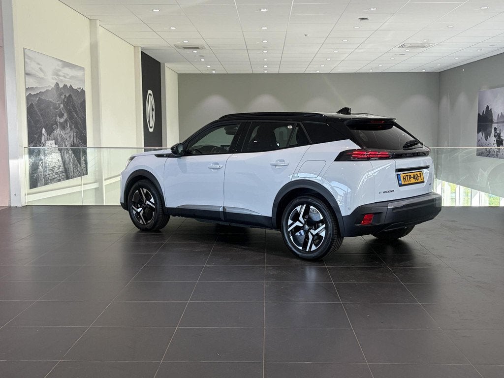 Peugeot e-2008 EV GT Avantage 54 kWh SoH 96% | Climate Contr, Auto's, 12 maanden, Gebruikt, Wit, Origineel Nederlands