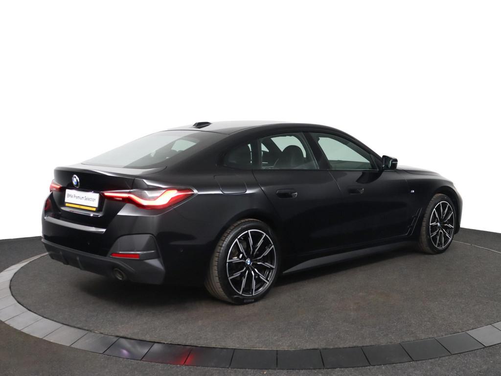 BMW 4-serie Gran Coupé 420i Business Edition Plus | M Sport, Auto's, BMW, 1998 cc, Gebruikt, Met garantie (alle), Zwart