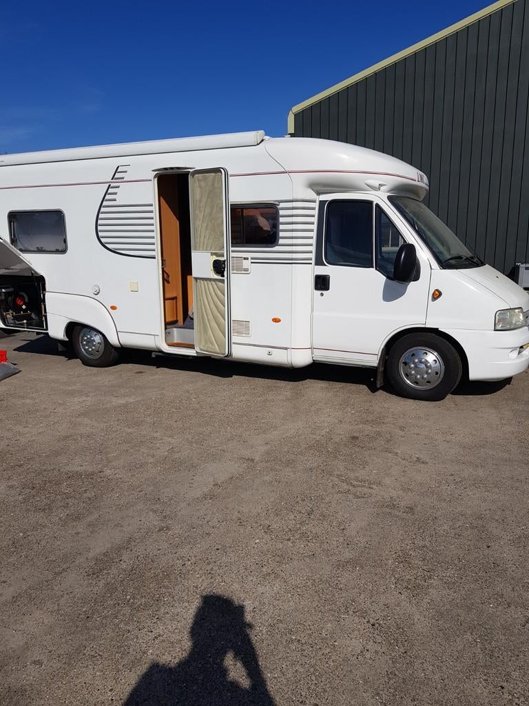 LMC LIBERTY 6600 TI.Bouwjaar 2003, Caravans en Kamperen, Campers, Buitenlamp, Standaard zit, Ringverwarming, Decoder