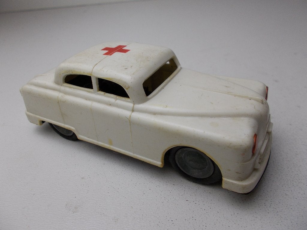 Jr 50/60 Plastic AMBULANCE + METALEN FRICTIE/VLIEGWIEL Werkt, Hobby en Vrije tijd, Ophalen of Verzenden, Gebruikt, Auto, Overige merken