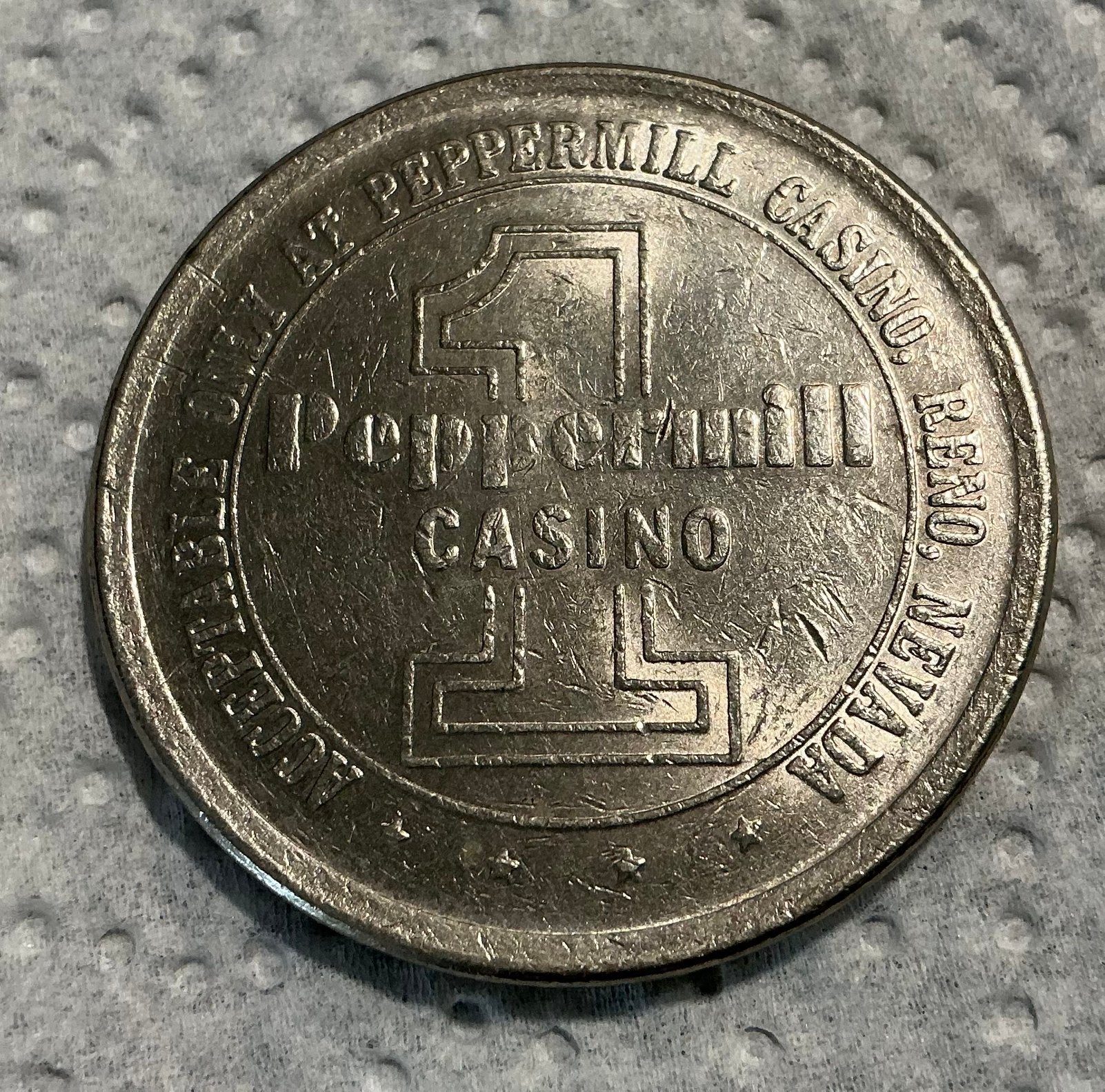 1 dollar casino gaming token USA peppermill RENO NEVADA, Overige munten, Ophalen of Verzenden, Gebruikt