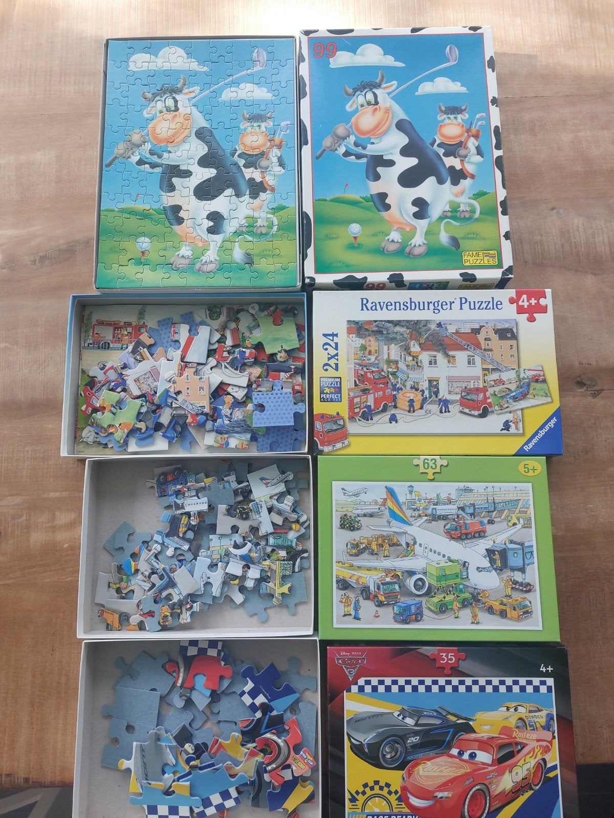 Diverse puzzels: Koeien, Brandweer, Vliegveld, Cars, Ophalen, Meer dan 50 stukjes, Gebruikt, 4 tot 6 jaar