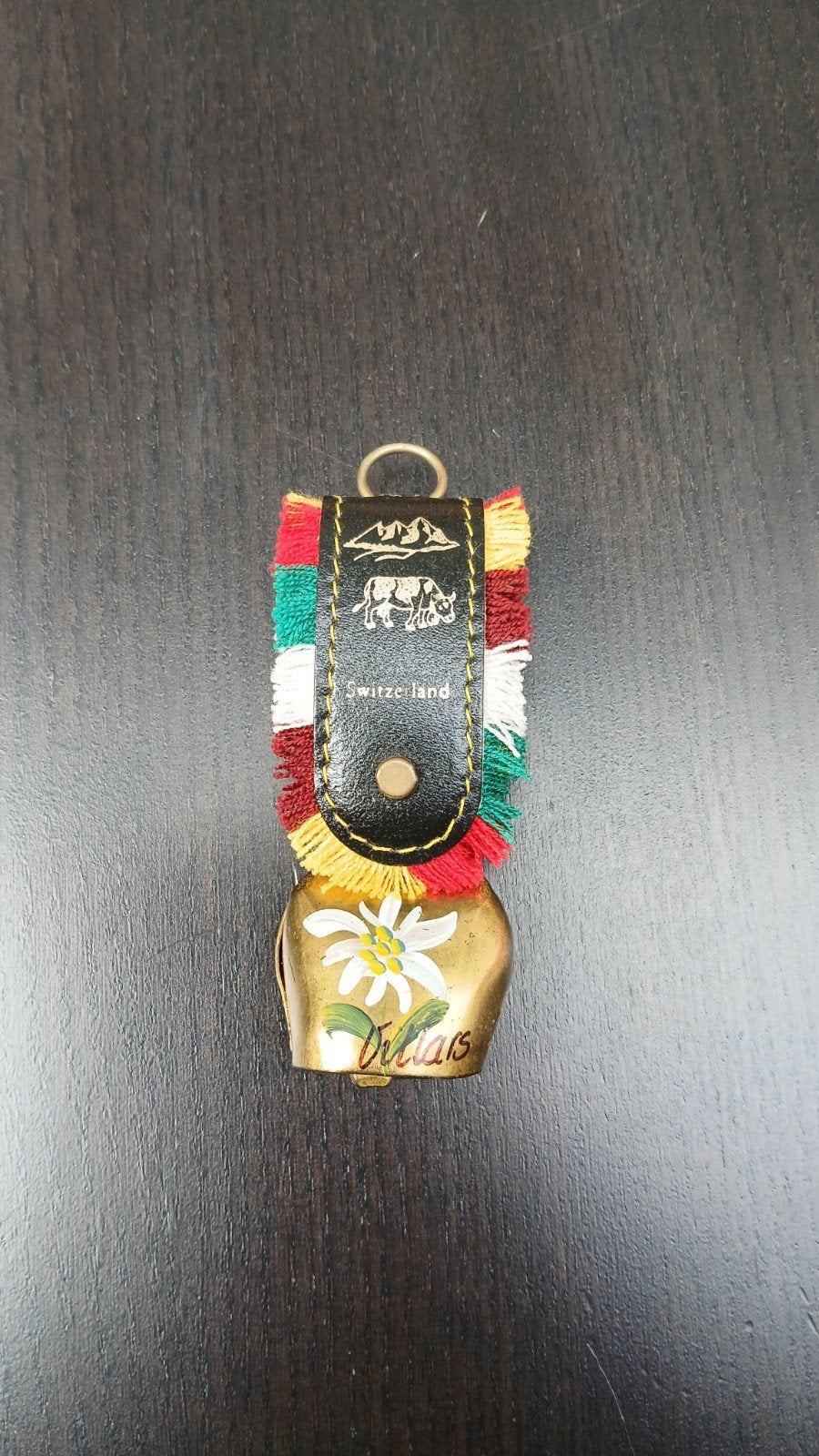 Zwitsers koebelletje aan leren band, Ophalen of Verzenden, Zo goed als nieuw, Stad of Land
