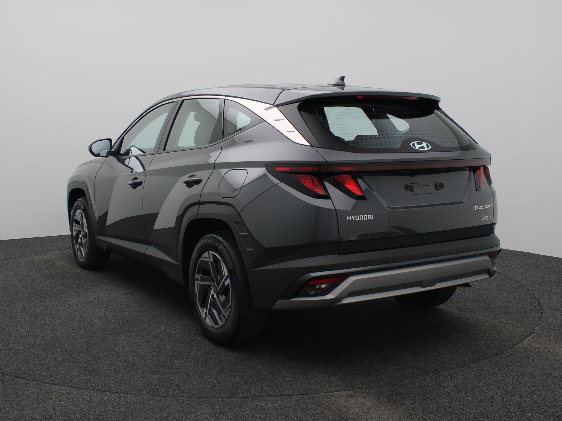 Hyundai Tucson 1.6 T-GDI PHEV E-Motion | Achteruitrijcamera, Auto's, 4 cilinders, Bedrijf, Hybride Elektrisch/Benzine, Tucson