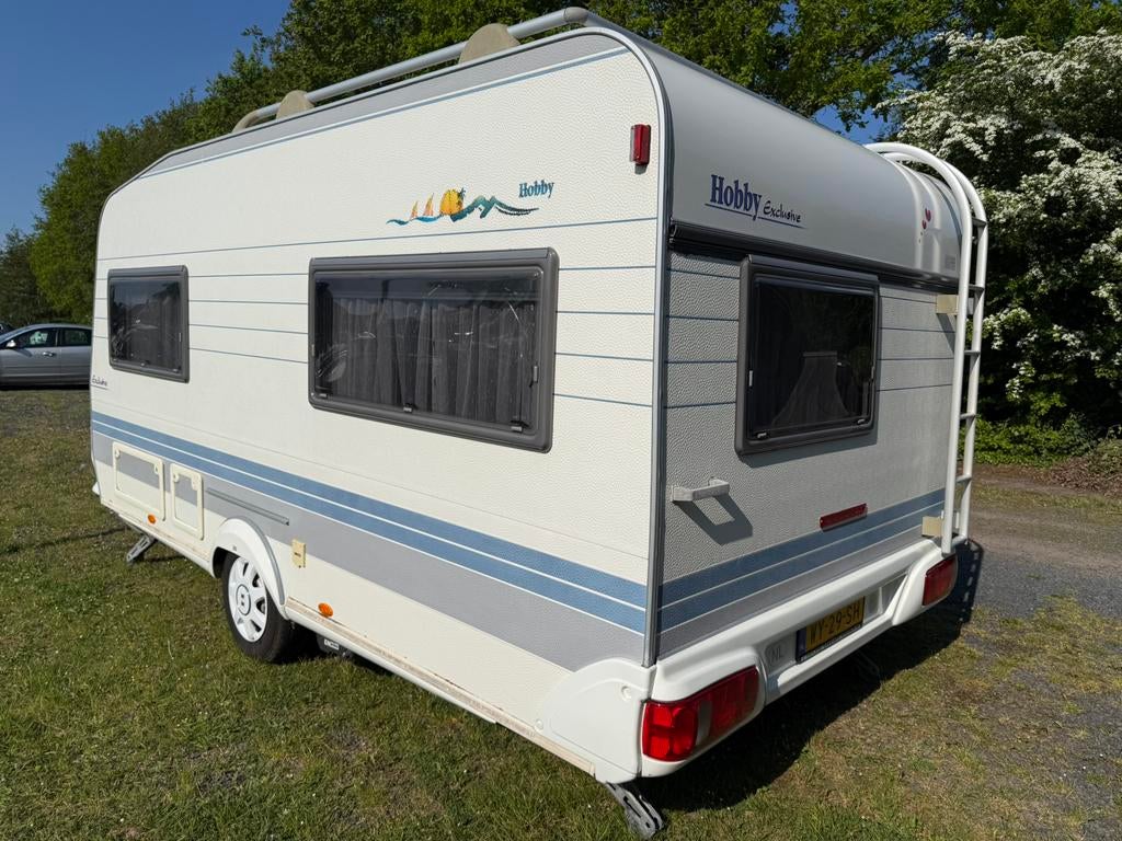 Hobby 440 exclusive met mover en compleet inventaris, Caravans en Kamperen, Kachel, Hobby, Frans bed, Treinzit