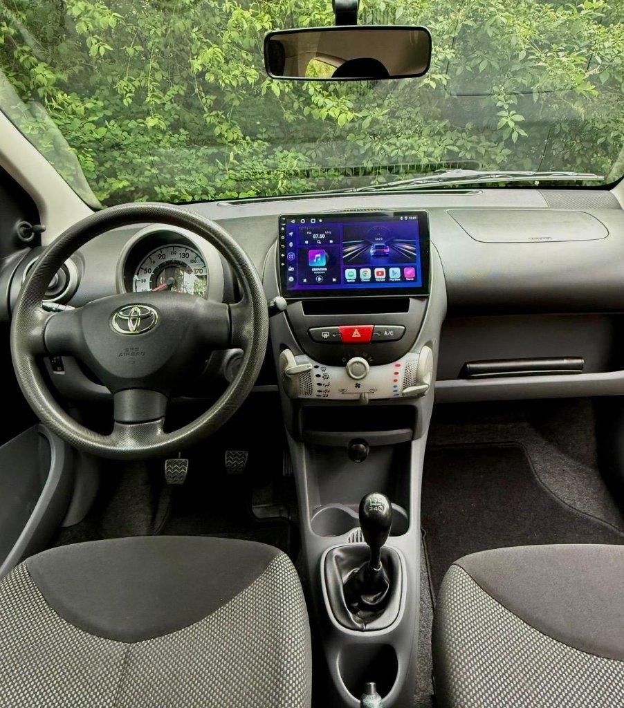 Toyota Aygo - Airco -  Carplay - Electr.pakket - All seasons, Voorwielaandrijving, Stof, 4 stoelen, Bedrijf