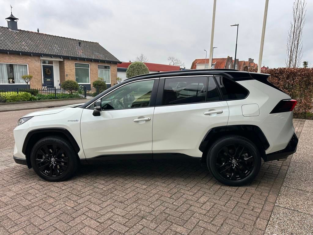 Toyota RAV4 2.5 Hybrid AWD Executive Bi-Tone|Leder|Apple Car, Automaat, Gebruikt, 4 cilinders, 1650 kg