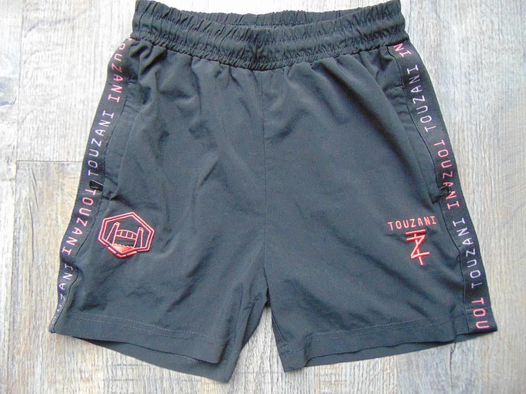Touzani korte broek zwart sportbroek maat 140 broekje, Broek, Ophalen of Verzenden, Zo goed als nieuw, Touzani