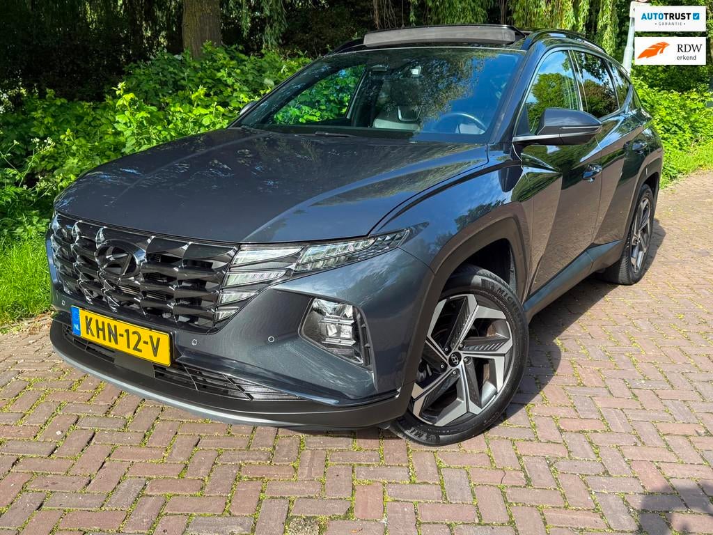 Hyundai TUCSON 1.6 T-GDI PHEV Premium Sky 4WD 265 PK 1Eig. b, Auto's, Hyundai, Automaat, 1350 kg, 4 cilinders, Adaptive Cruise Control