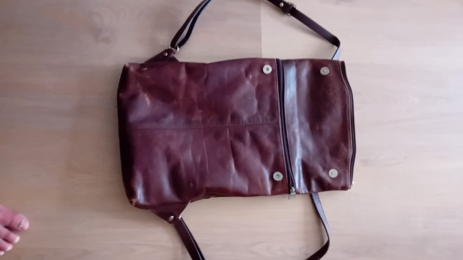 Sasa leren design handtas / rugtas/ schoudertas, Sieraden, Tassen en Uiterlijk, Tassen | Damestassen, Ophalen of Verzenden, Zo goed als nieuw