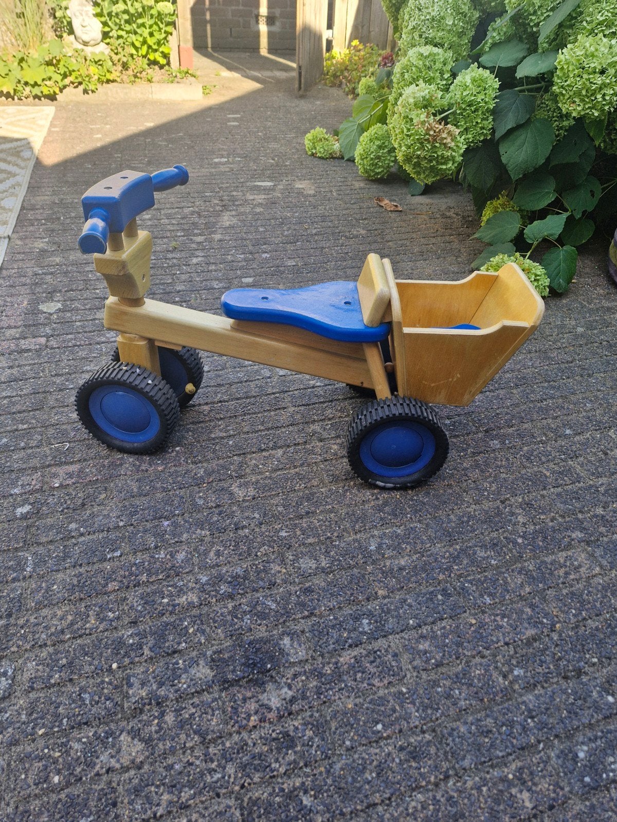 houten loopwagentje, Ophalen