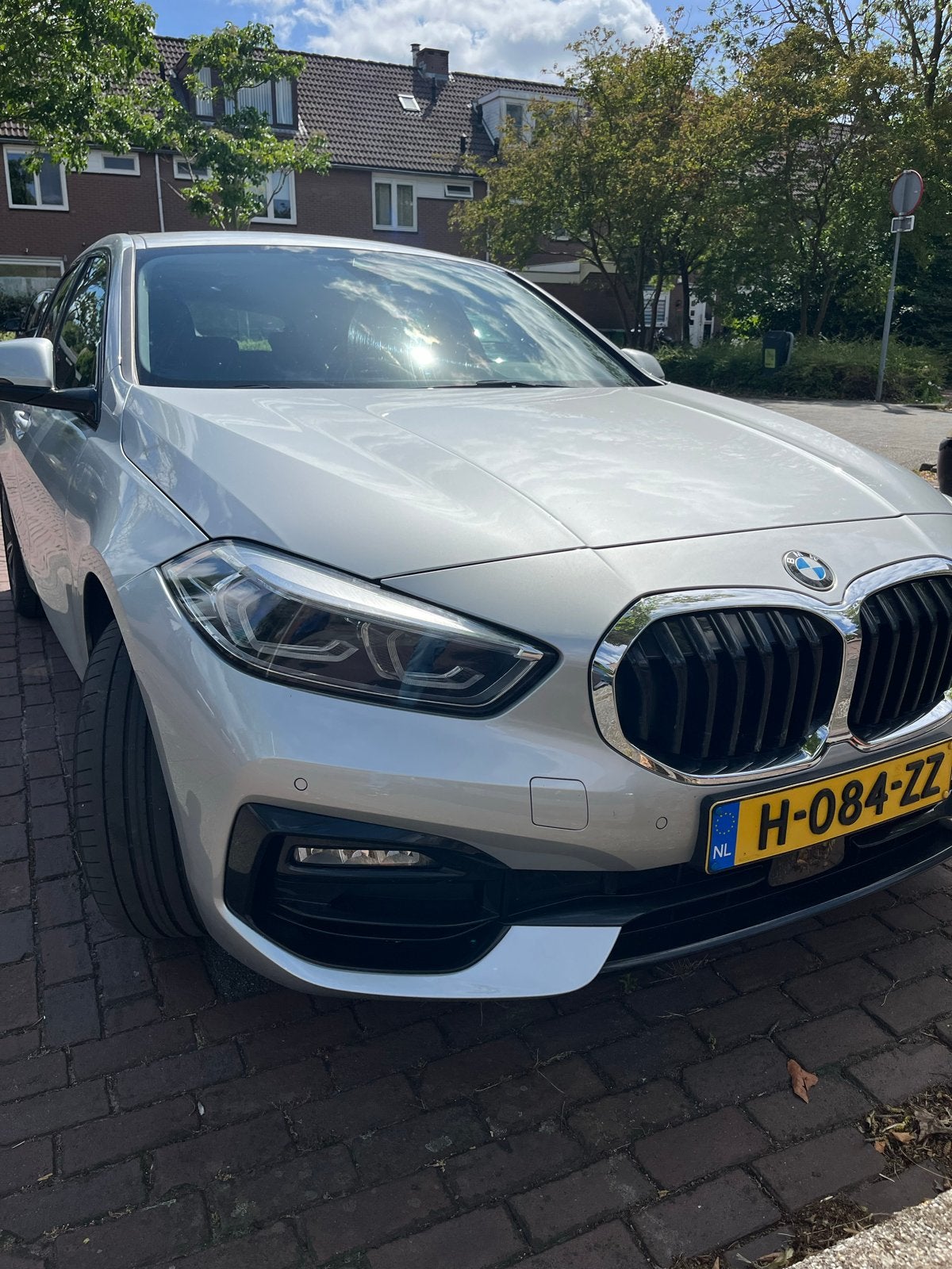 BMW 1-Serie 118i 140pk Aut 2020 Grijs, Leder en Stof, Origineel Nederlands, Particulier, Zilver of Grijs