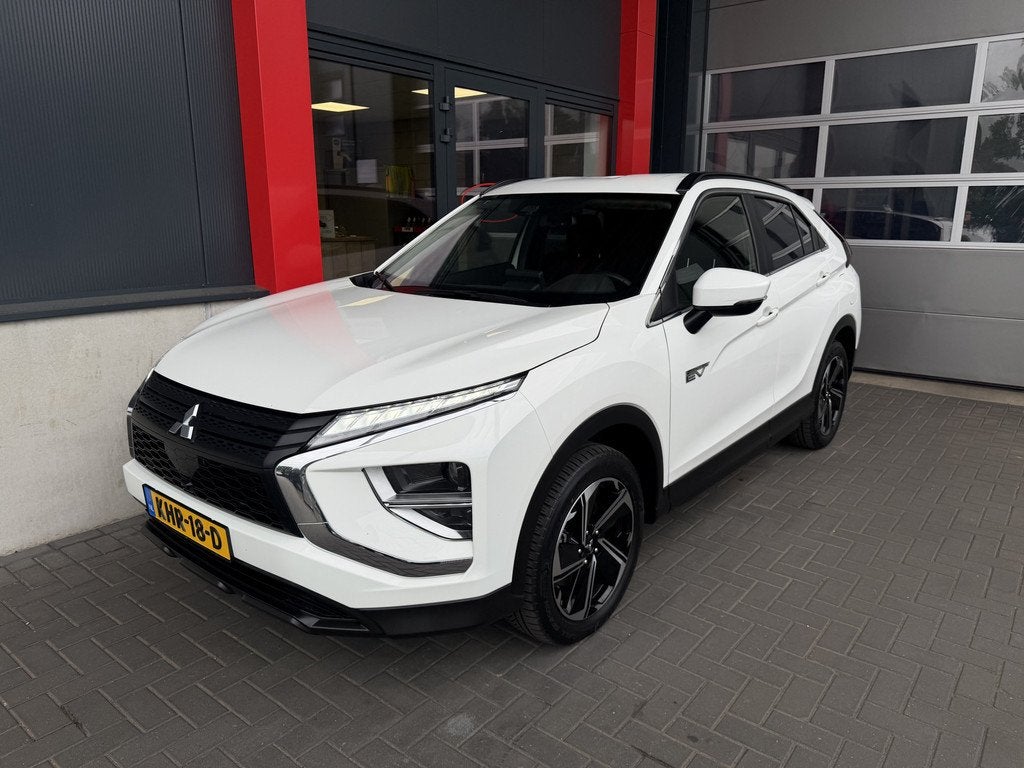 Mitsubishi Eclipse Cross 2.4 PHEV Intense+ 8 Jaar fabrieksga, Auto's, Mitsubishi, Automaat, Stof, 4 cilinders, Wit