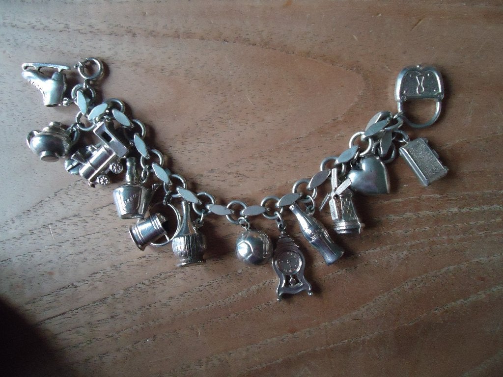 prachtige echt zilveren bedelarmband met 14 zilveren bedels, Sieraden, Tassen en Uiterlijk, Armbanden, Ophalen of Verzenden, Zo goed als nieuw