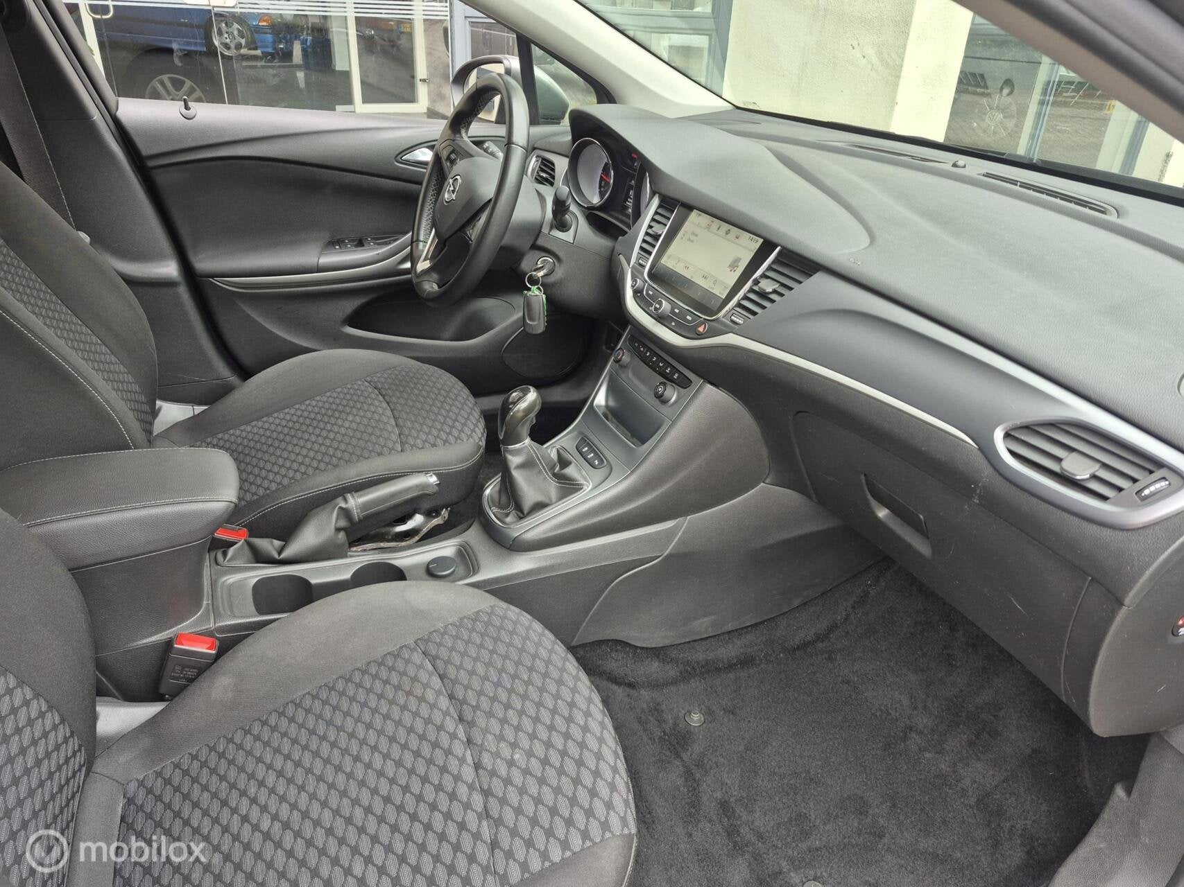 Opel Astra Sports Tourer 1.0 Innovation 1e eig.✅|Carplay, Voorwielaandrijving, Stof, Euro 6, 1178 kg