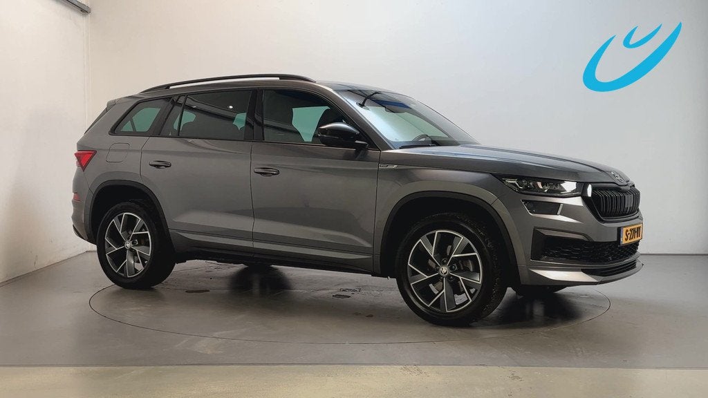 Skoda Kodiaq 1.5 TSI Sportline Business 7p. Camera Adaptive, Auto's, Skoda, 4 cilinders, 7 stoelen, Bedrijf, Kodiaq