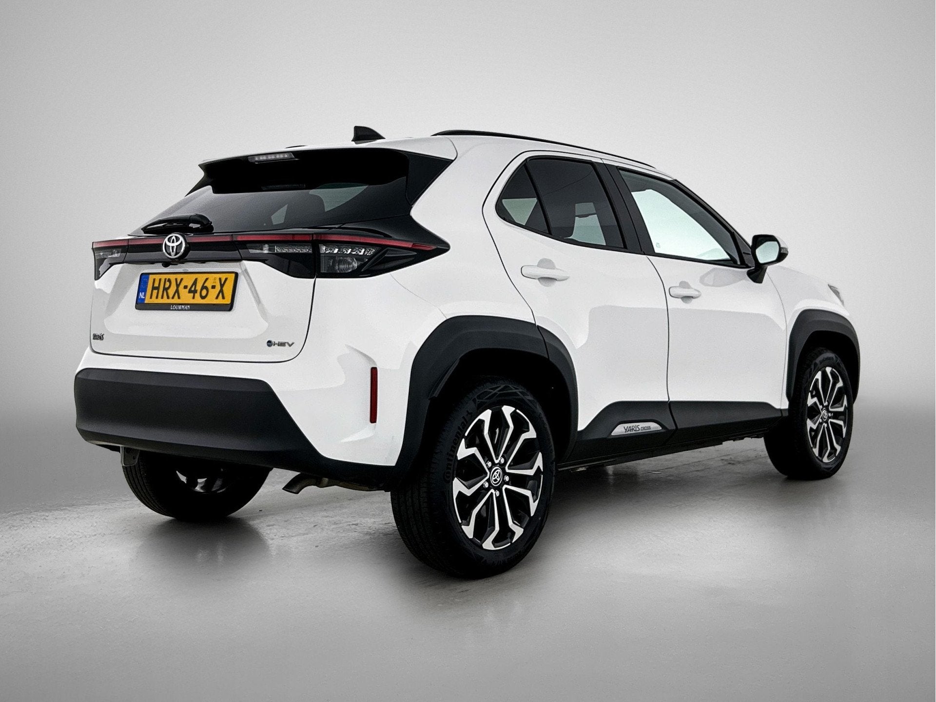 Toyota Yaris Cross 1.5 Hybrid 115 Dynamic (bj 2025), Stof, Gebruikt, 116 pk, Bedrijf