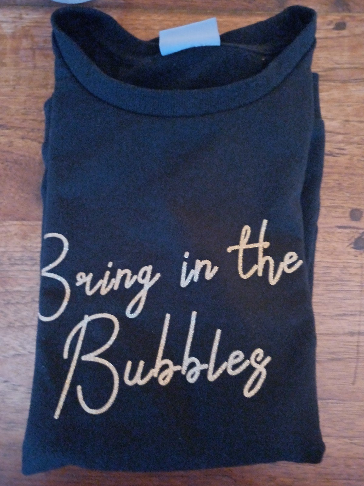 Zwart T-shirt 'Bring in the Bubbles' - Maat M, Maat 38/40 (M), Zwart, Ophalen of Verzenden, Zo goed als nieuw