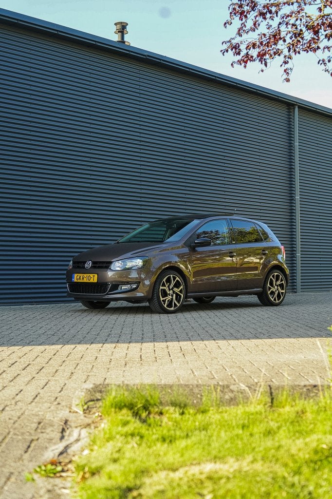 Volkswagen Polo 1.4 63KW AUT 2011 Bruin, Auto's, Volkswagen, Stof, Zwart, 4 cilinders, Bruin