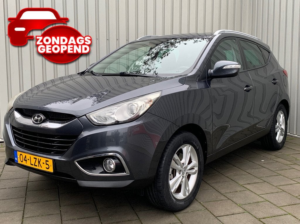 Hyundai Ix35 2.0i Business Edition|Navigatie|149000KM|Climat, Auto's, Hyundai, Zwart, 4 cilinders, Leder en Stof, 163 pk