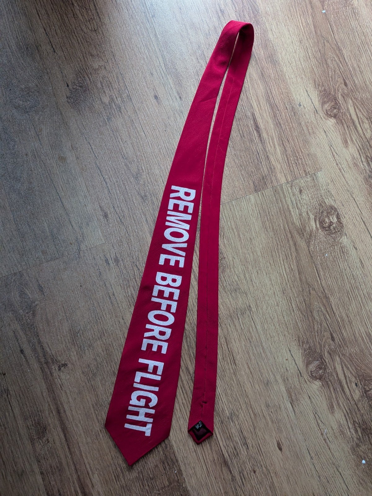 Stropdas Remove Before Flight, Ophalen of Verzenden, Nieuw, Overige typen