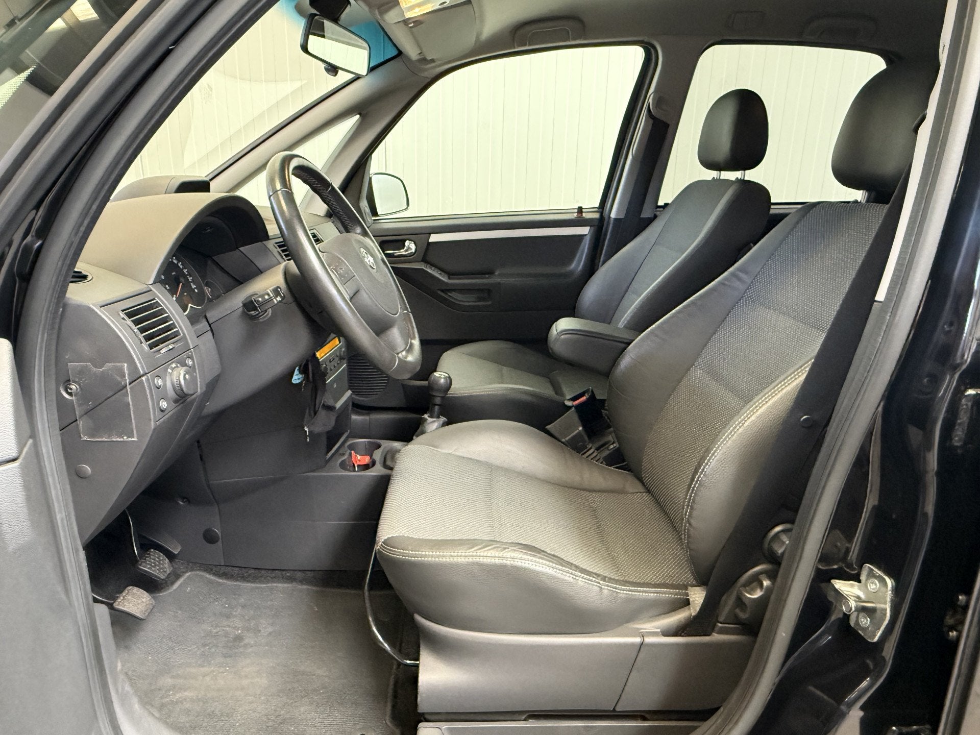 Opel Meriva 1.6-16V Cosmo NAVIGATIE-AIRCO/ECC-LEDER-TREKHAAK, Auto's, Voorwielaandrijving, Parkeersensor, 15 km/l, Gebruikt