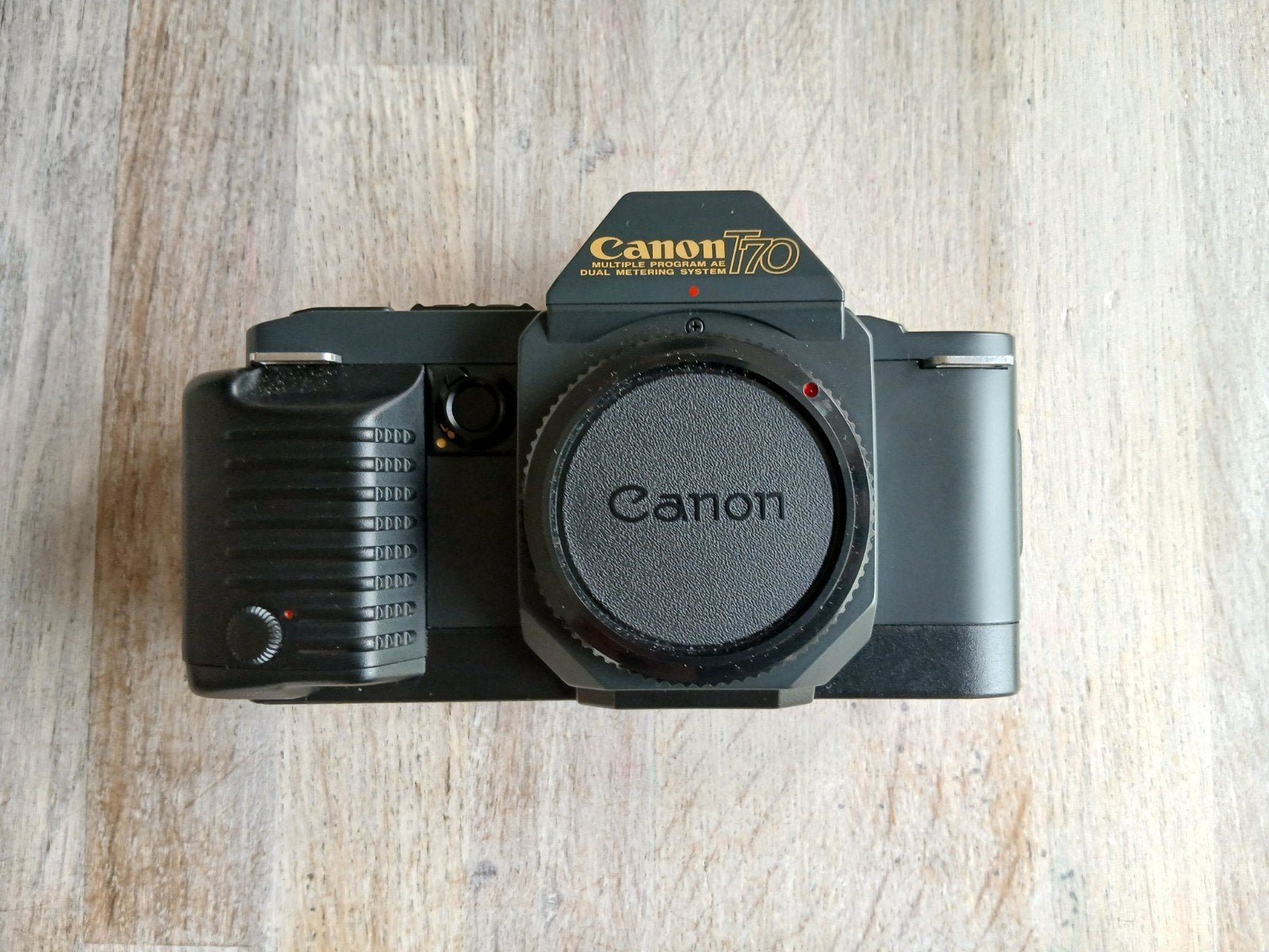 Canon T70 spiegelreflexcamera met handleidingen. Nieuwstaat, Audio, Tv en Foto, Ophalen of Verzenden, Zo goed als nieuw, Spiegelreflex