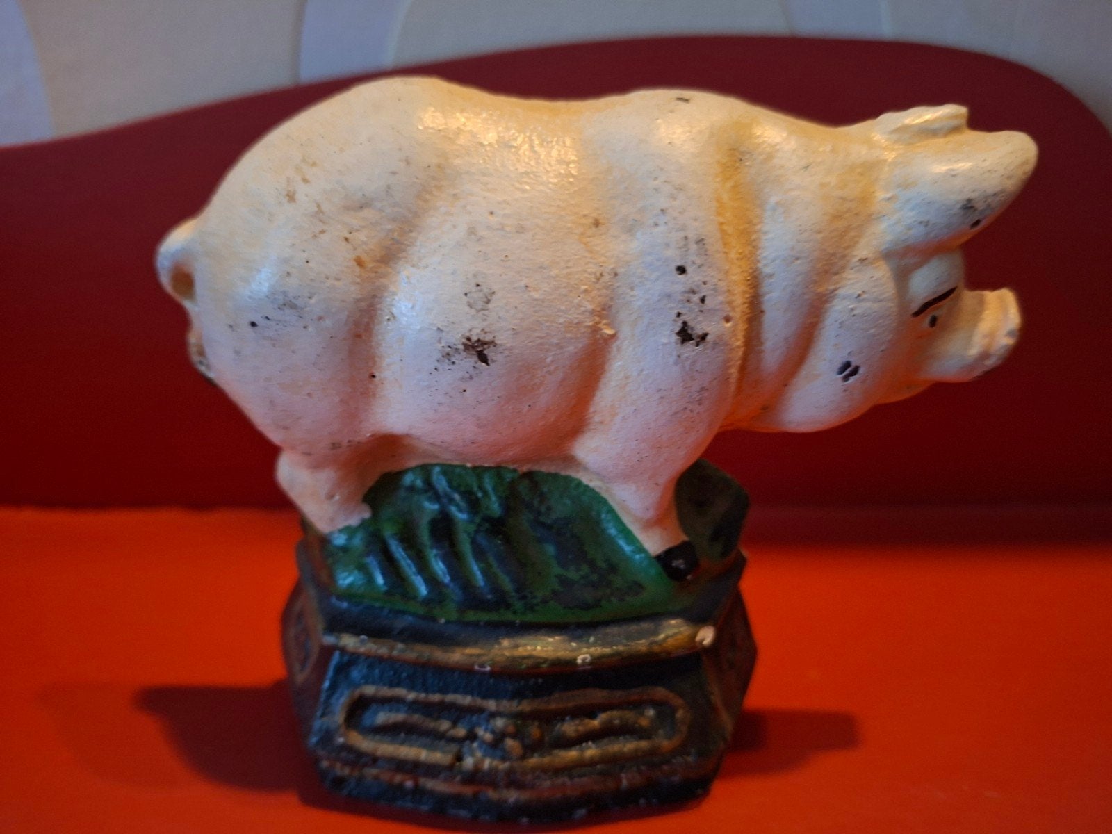 Gietijzeren deurstopper varken, Ophalen