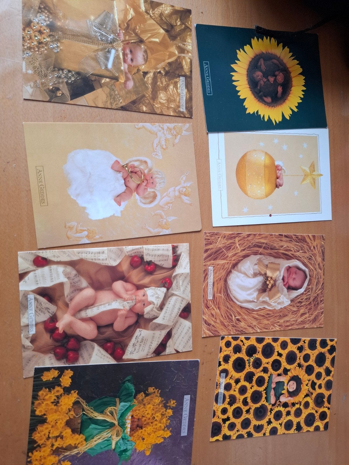 Ansichtkaarten Anne Geddes - Baby's en Bloemen (8 stuks), Verzamelen, Ophalen of Verzenden