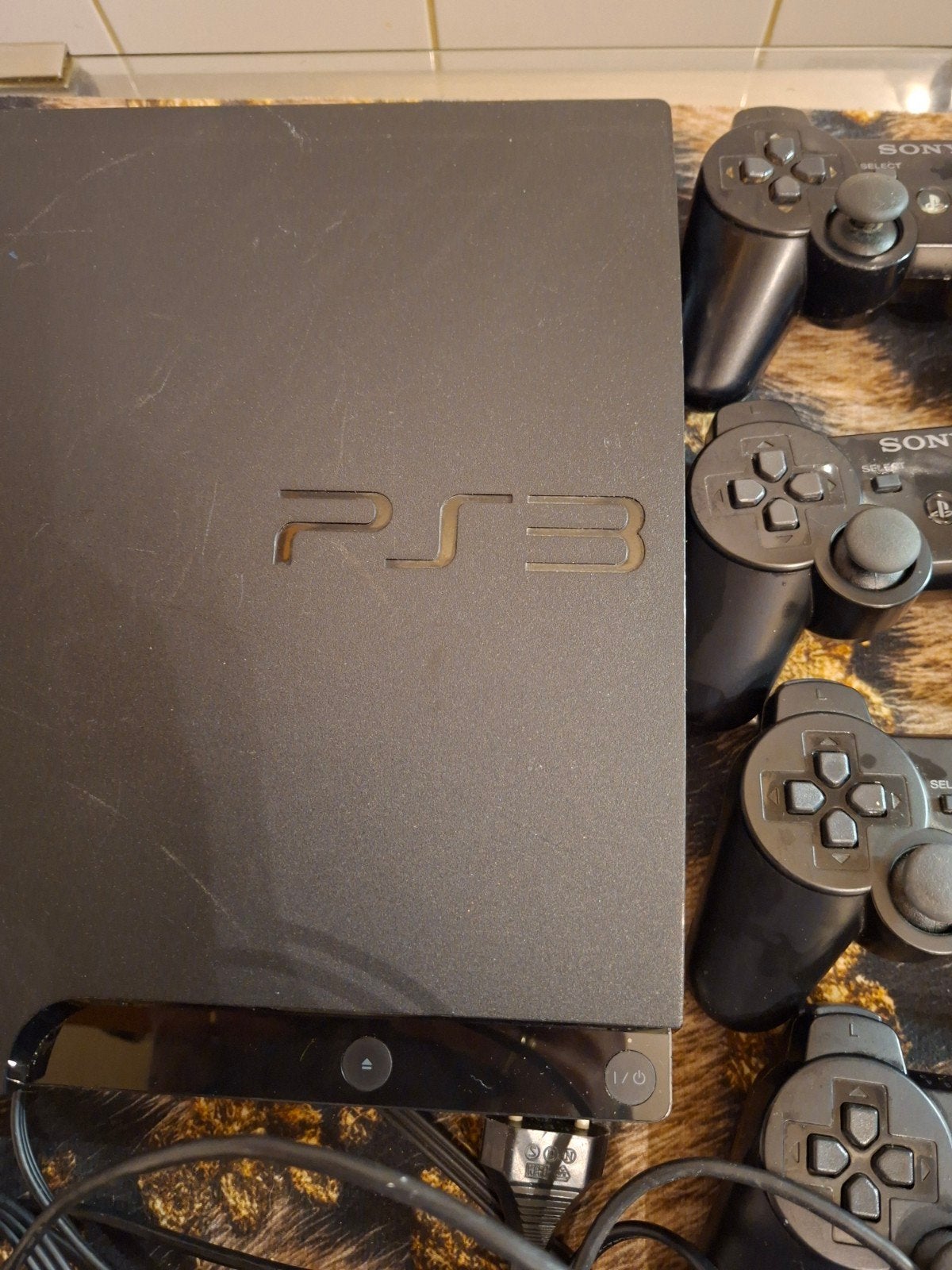 playstation 3, Ophalen of Verzenden, Gebruikt, Met 3 controllers of meer, Slim