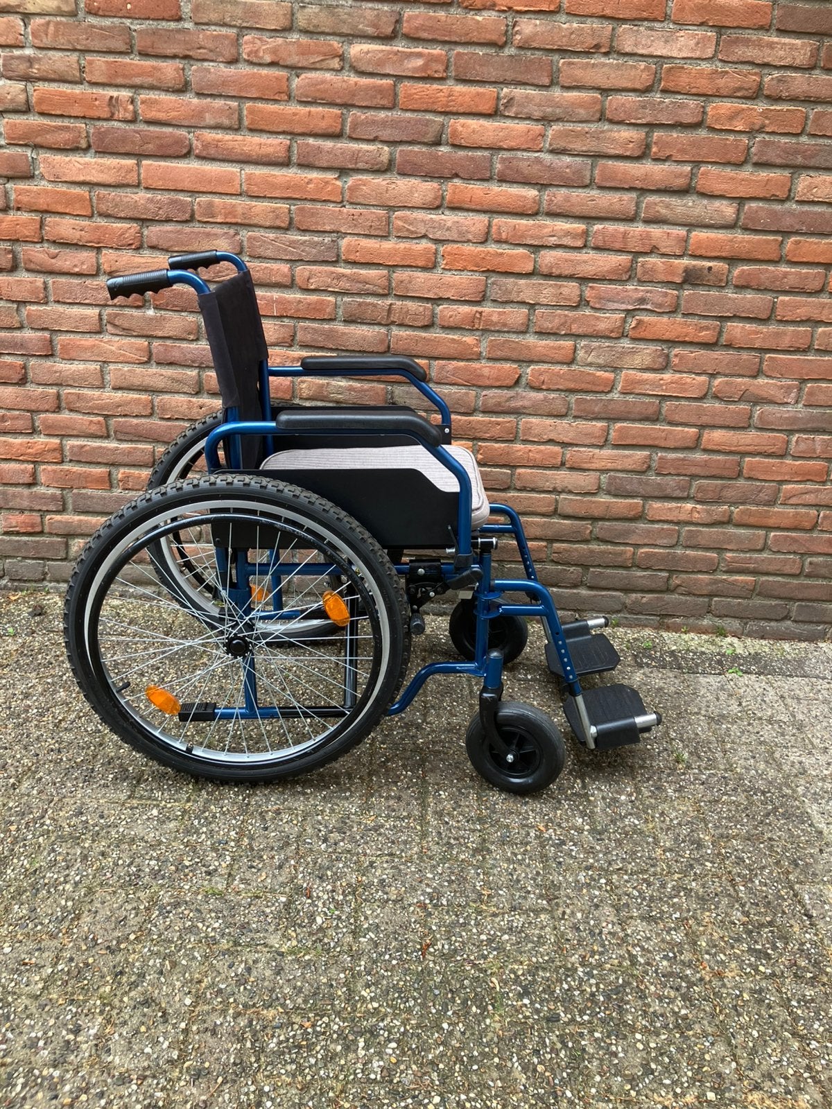 Brede banden rolstoel, Ophalen, Inklapbaar, Zo goed als nieuw, Duwrolstoel