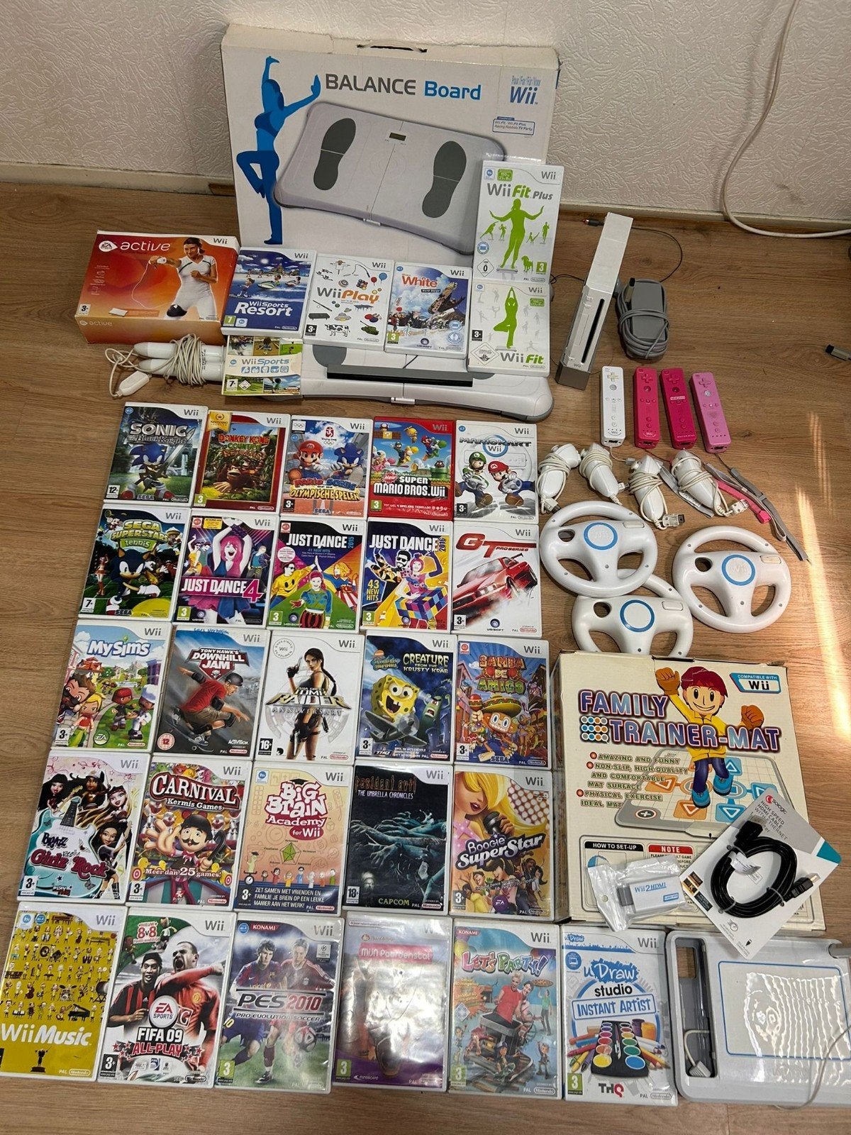 Nintendo Wii met 32 spellen., 3 spelers of meer, Ophalen of Verzenden, Sport, Vanaf 3 jaar