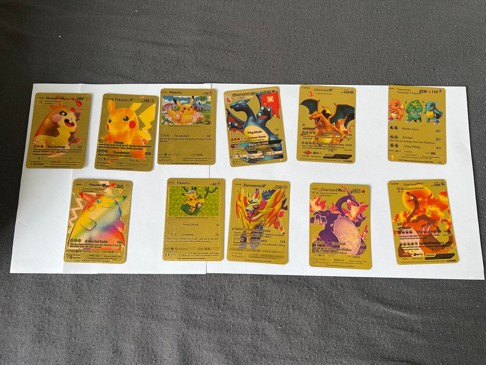 Gouden Pokémon kaarten set - Pikachu, Charizard, Zamazenta, Ophalen of Verzenden, Zo goed als nieuw, Meerdere kaarten, Foil