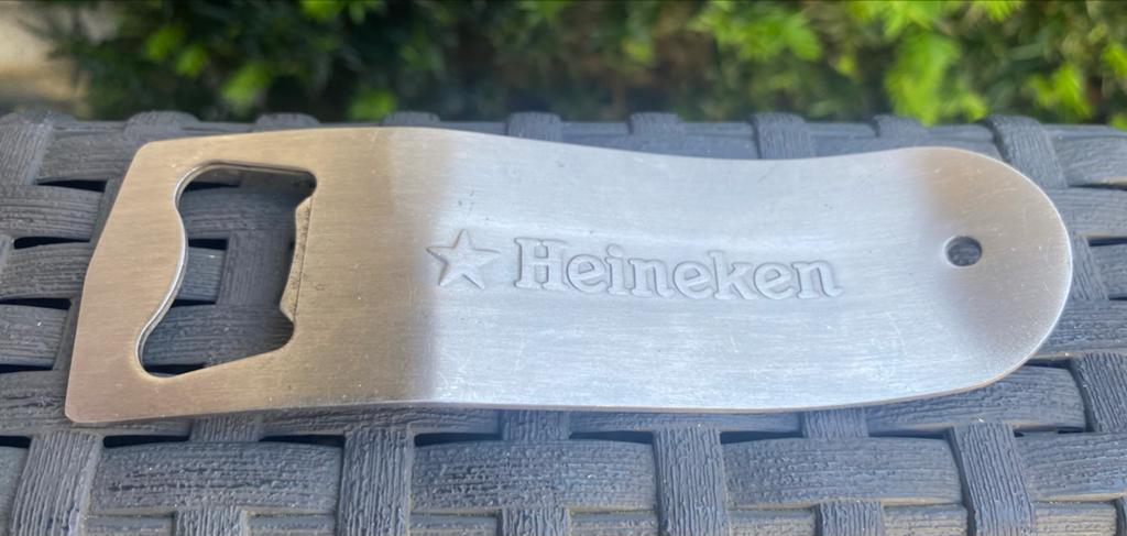 Flesopener van Heineken. Lengte 12 cm., Verzamelen, Biermerken, Ophalen of Verzenden, Zo goed als nieuw, Flesopener, Heineken