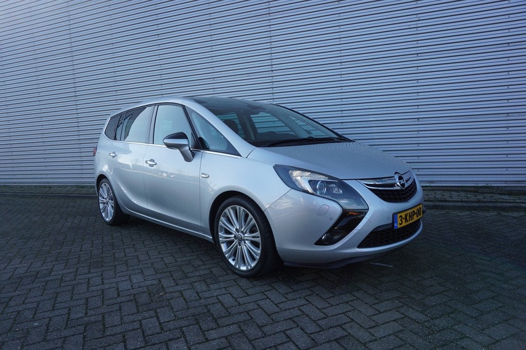 Opel Zafira Tourer 1.4 Cosmo 7persoons - Airco / Navi / Crui, Auto's, Opel, Euro 5, Stof, 4 cilinders, 7 stoelen
