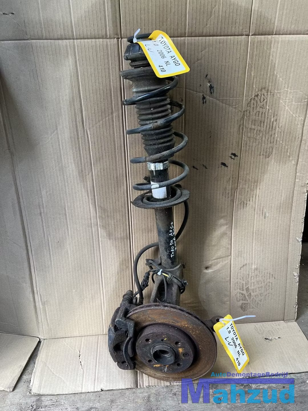 TOYOTA AYGO Links veerpoot compleet met remklauw 2005-2014, Info@toyota.co.jp, Gebruikt, Toyota Motor Corporation, Toyota