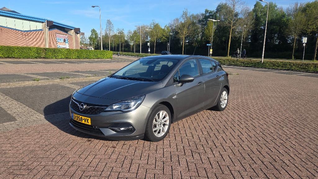 Opel Astra 1.2 Turbo 130pk Start/stop 2020 Grijs, Auto's, Opel, Particulier, Astra, Achteruitrijcamera, Airbags, Airconditioning