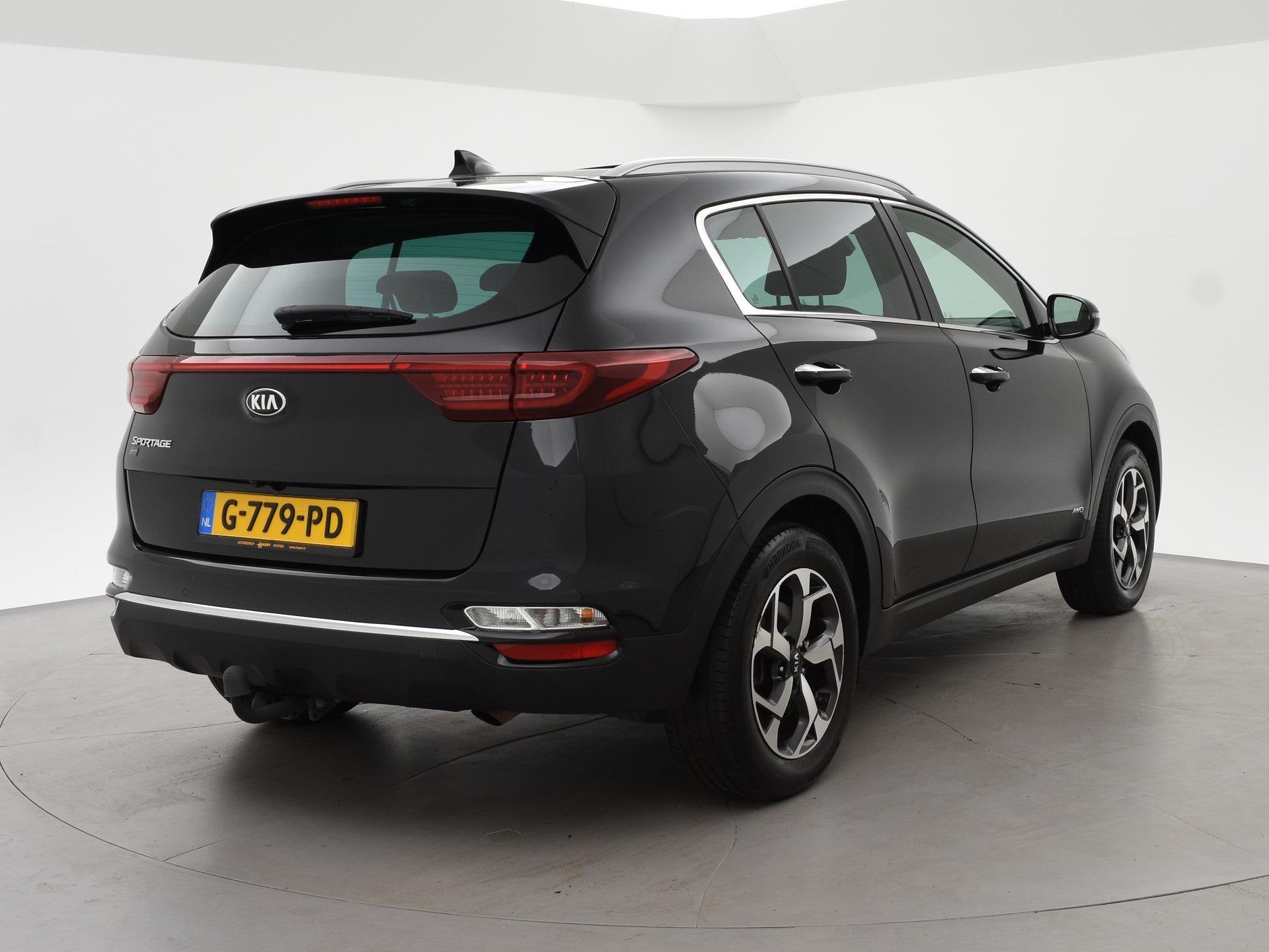 Kia Sportage 1.6 T-GDI 4WD 177 PK AUT. DYNAMICPLUSLINE + PAN, Auto's, Automaat, Gebruikt, 4 cilinders, Leder en Stof