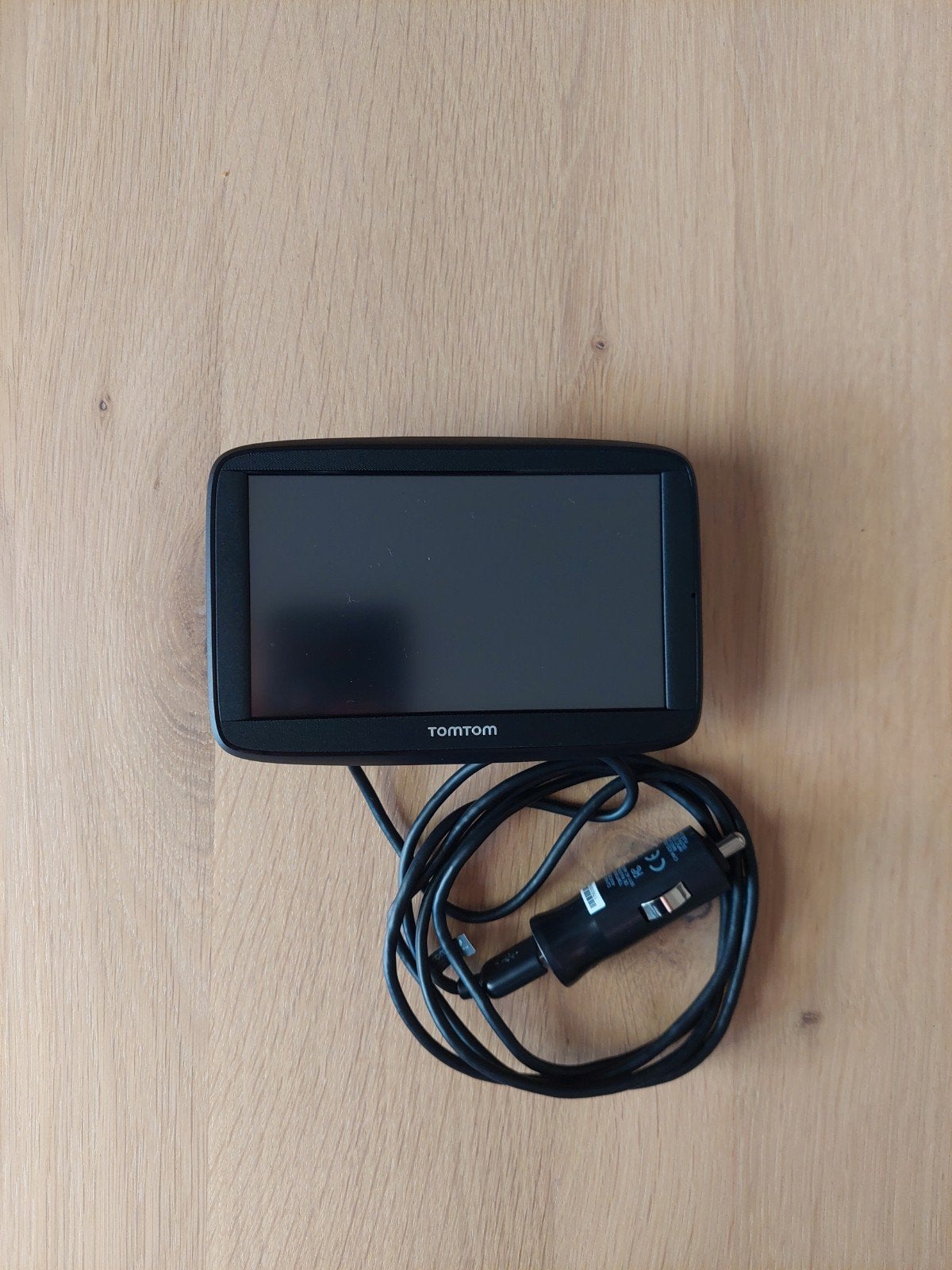 TomTom navigatiesysteem met hoes en 12V-autolader, Ophalen of Verzenden, Zo goed als nieuw