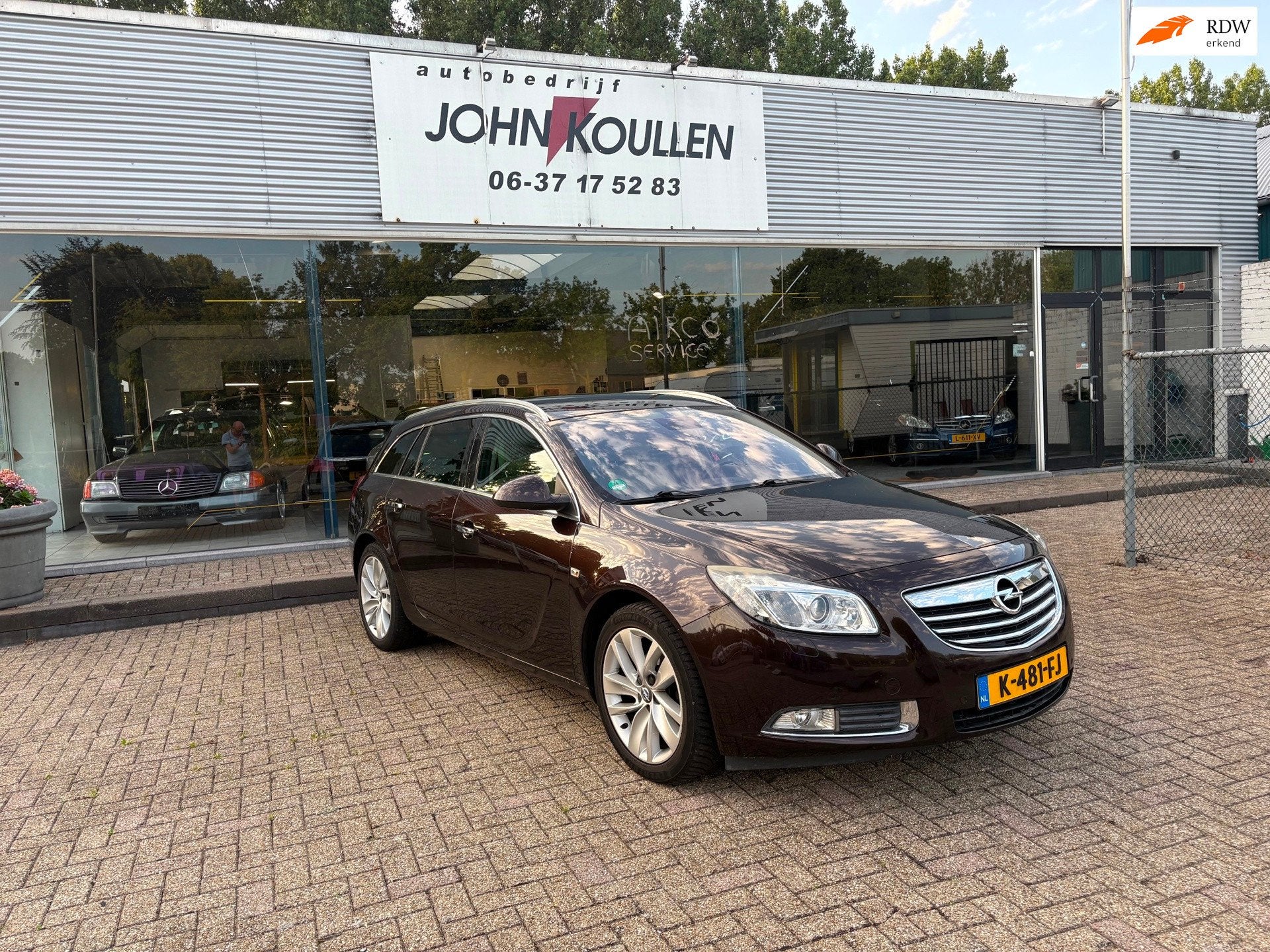 Opel Insignia Sports Tourer 1.4 Turbo EcoFLEX Cosmo, Auto's, Opel, Euro 5, Gebruikt, 4 cilinders, Bruin