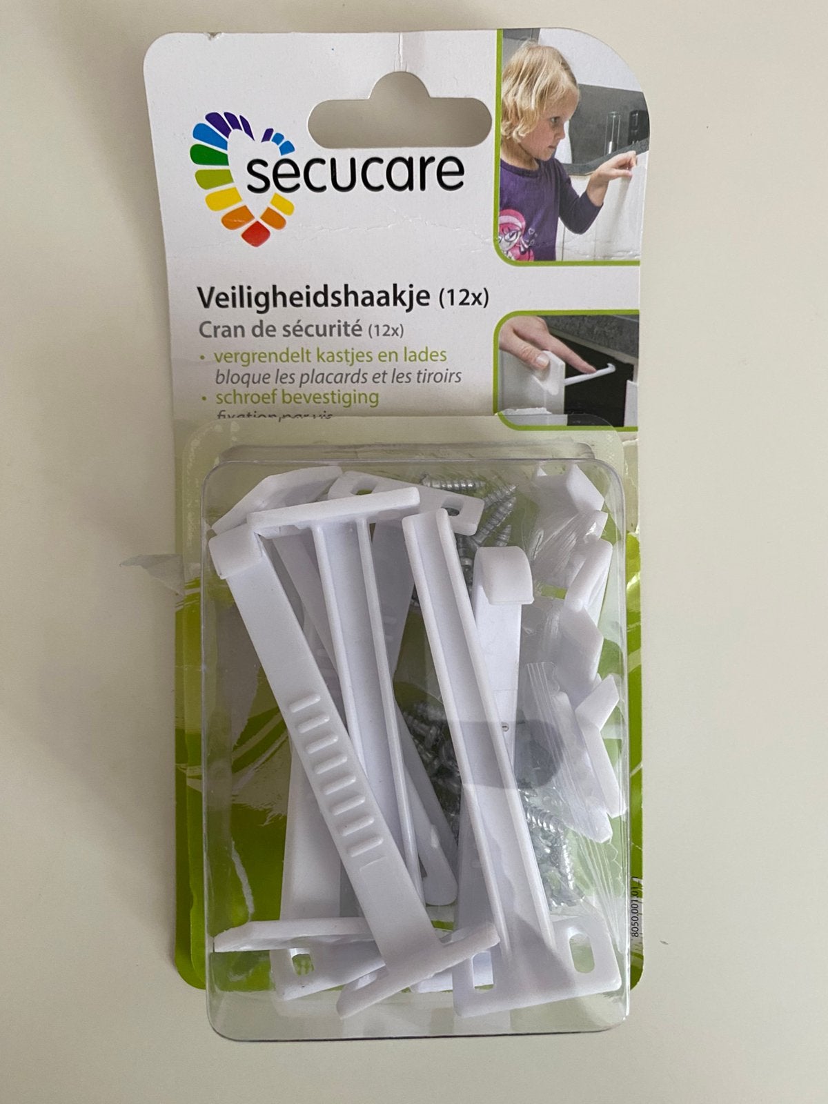 7x veiligheidshaakjes (kinderslot voor kast/lade), Ophalen, Zo goed als nieuw