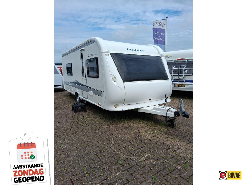 Hobby Prestige 560 WLU met mover, Caravans en Kamperen, Caravans, Bedrijf, tot en met 4, 1250 - 1500 kg, Rondzit, Hobby, 2 aparte bedden