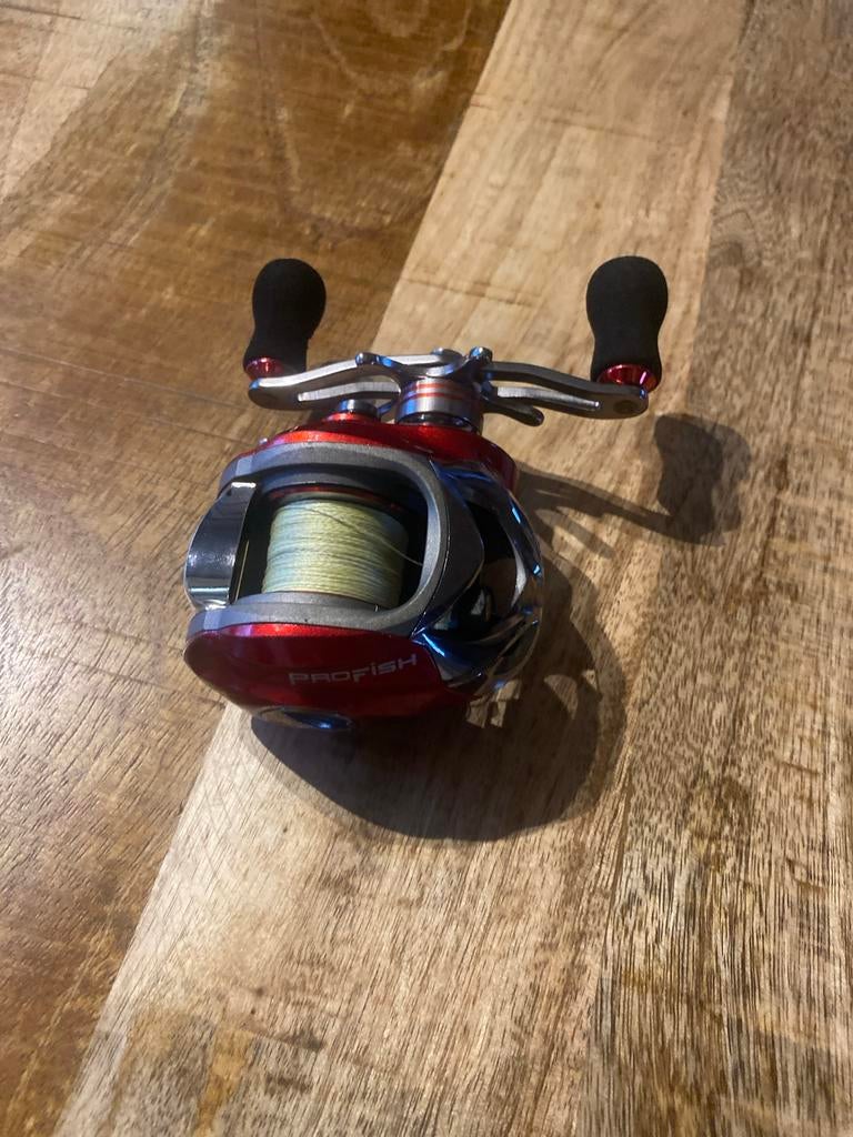 Profish CRUS Baitcasting Reel - Zo goed als nieuw!, Ophalen of Verzenden, Zo goed als nieuw, Molen