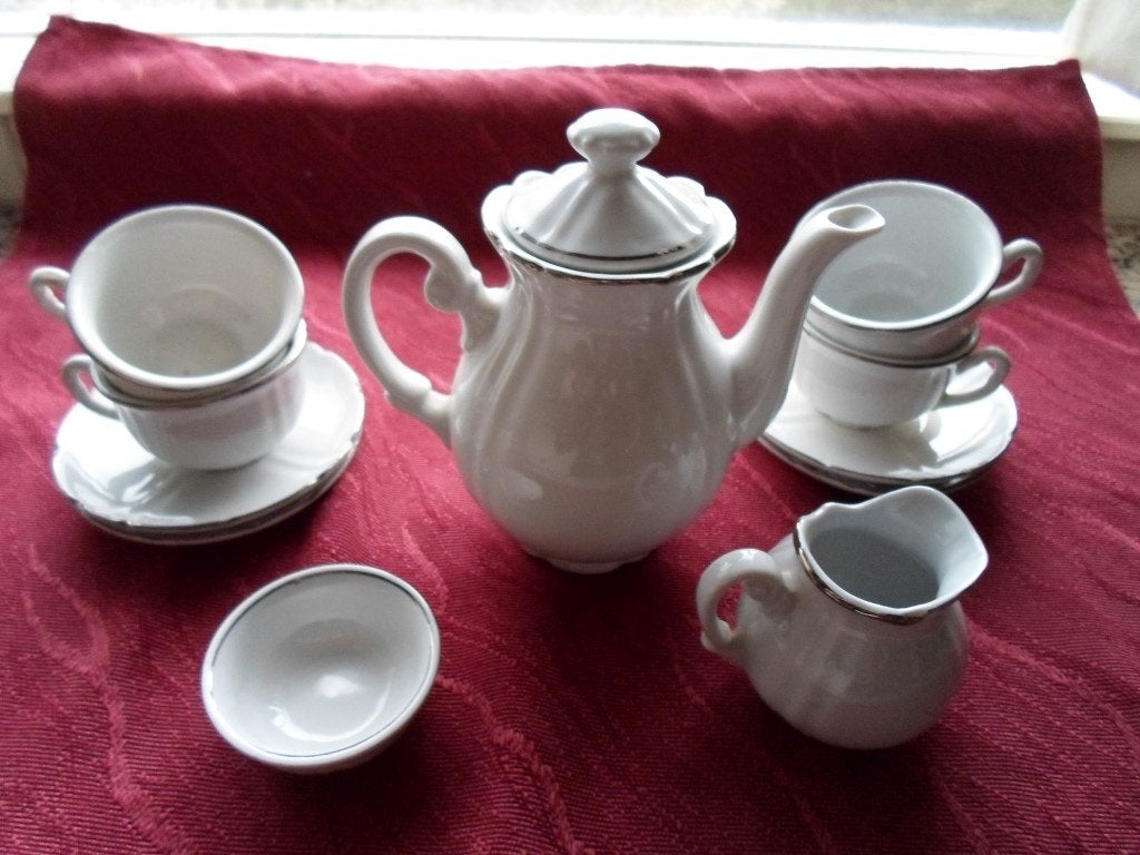 Oud kinderserviesje. Porselein. Zilverlijn. Douwe Egberts, Verzamelen, Ophalen of Verzenden, Gebruikt